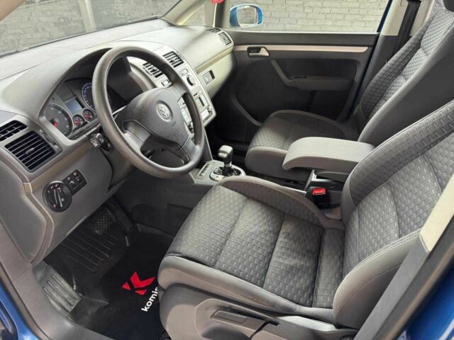 Синий Фольксваген Туран, объемом двигателя 1.4 л и пробегом 241 тыс. км за 6399 $, фото 9 на Automoto.ua