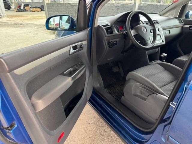 Синий Фольксваген Туран, объемом двигателя 1.4 л и пробегом 241 тыс. км за 6399 $, фото 7 на Automoto.ua