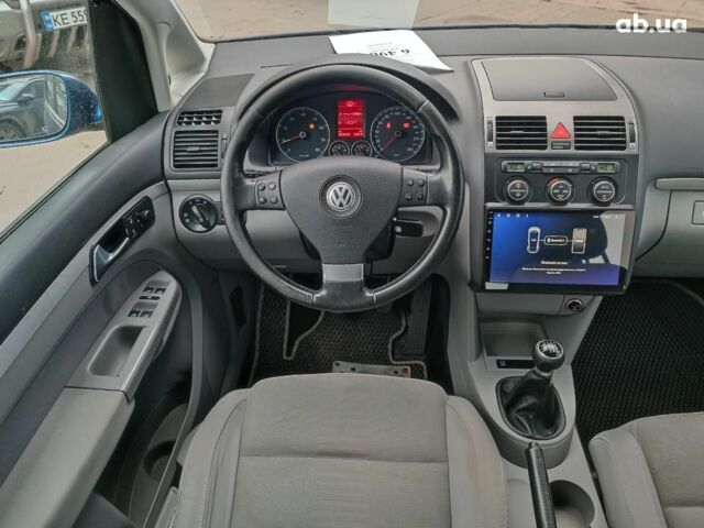 Синій Фольксваген Туран, об'ємом двигуна 1.4 л та пробігом 224 тис. км за 6490 $, фото 16 на Automoto.ua