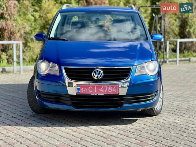Синий Фольксваген Туран, объемом двигателя 1.4 л и пробегом 260 тыс. км за 6750 $, фото 6 на Automoto.ua