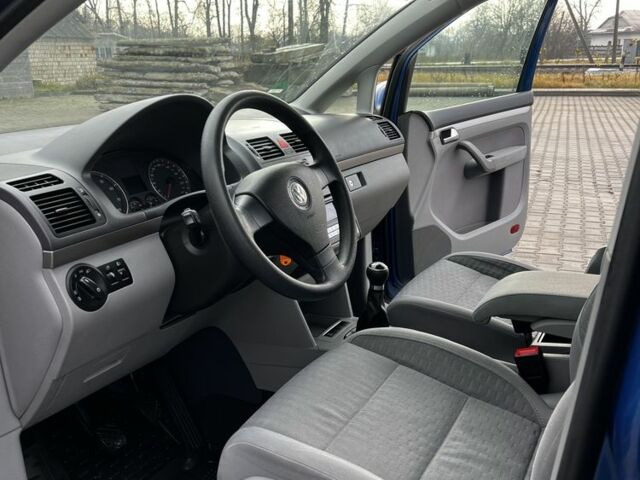 Синій Фольксваген Туран, об'ємом двигуна 1.4 л та пробігом 208 тис. км за 6899 $, фото 3 на Automoto.ua