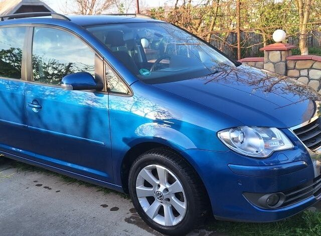 Синий Фольксваген Туран, объемом двигателя 1.9 л и пробегом 250 тыс. км за 7500 $, фото 1 на Automoto.ua