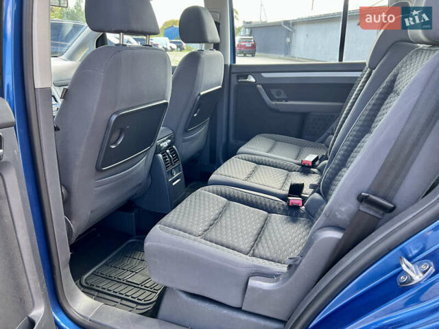 Синий Фольксваген Туран, объемом двигателя 1.4 л и пробегом 260 тыс. км за 6750 $, фото 48 на Automoto.ua