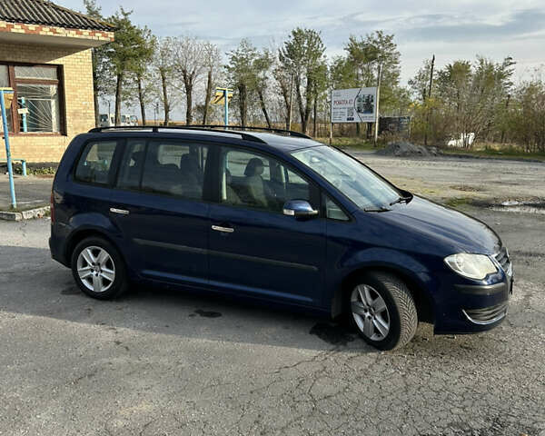 Синий Фольксваген Туран, объемом двигателя 1.4 л и пробегом 237 тыс. км за 6000 $, фото 16 на Automoto.ua