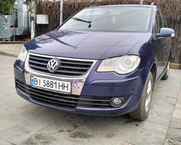 Синий Фольксваген Туран, объемом двигателя 1.39 л и пробегом 230 тыс. км за 6800 $, фото 4 на Automoto.ua