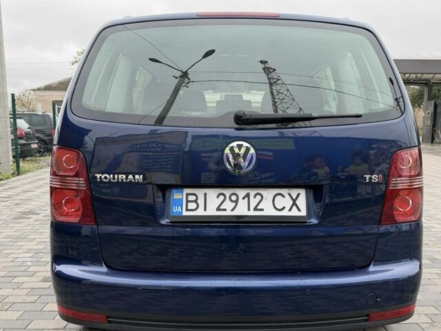 Синий Фольксваген Туран, объемом двигателя 1.4 л и пробегом 203 тыс. км за 7822 $, фото 3 на Automoto.ua