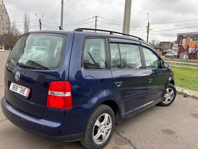 Синій Фольксваген Туран, об'ємом двигуна 1.9 л та пробігом 320 тис. км за 2800 $, фото 5 на Automoto.ua