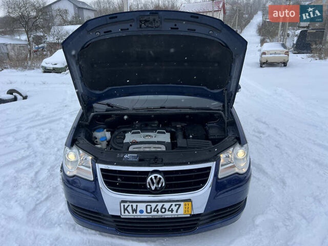 Синий Фольксваген Туран, объемом двигателя 1.4 л и пробегом 227 тыс. км за 7400 $, фото 51 на Automoto.ua