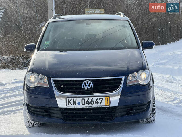 Синий Фольксваген Туран, объемом двигателя 1.4 л и пробегом 227 тыс. км за 7400 $, фото 2 на Automoto.ua