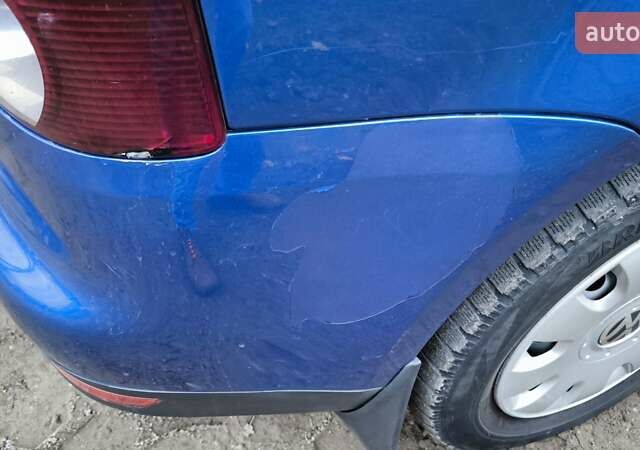 Синій Фольксваген Туран, об'ємом двигуна 2 л та пробігом 358 тис. км за 7500 $, фото 15 на Automoto.ua