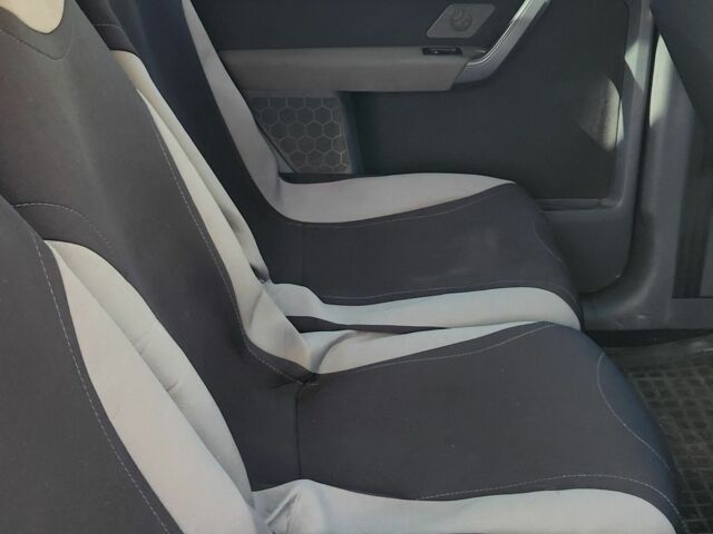 Синий Фольксваген Туран, объемом двигателя 1.9 л и пробегом 345 тыс. км за 7005 $, фото 4 на Automoto.ua