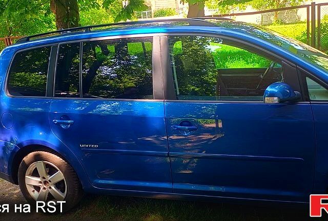 Синій Фольксваген Туран, об'ємом двигуна 1.4 л та пробігом 260 тис. км за 6000 $, фото 3 на Automoto.ua