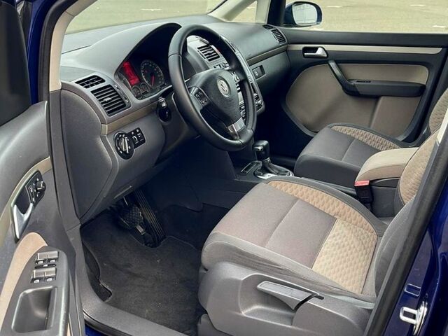 Синий Фольксваген Туран, объемом двигателя 1.4 л и пробегом 198 тыс. км за 6750 $, фото 7 на Automoto.ua