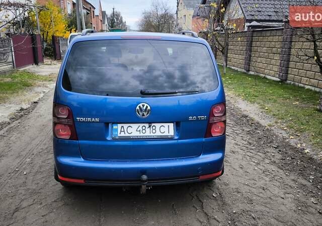 Синій Фольксваген Туран, об'ємом двигуна 2 л та пробігом 358 тис. км за 7500 $, фото 6 на Automoto.ua