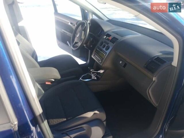 Синий Фольксваген Туран, объемом двигателя 1.4 л и пробегом 205 тыс. км за 7500 $, фото 2 на Automoto.ua