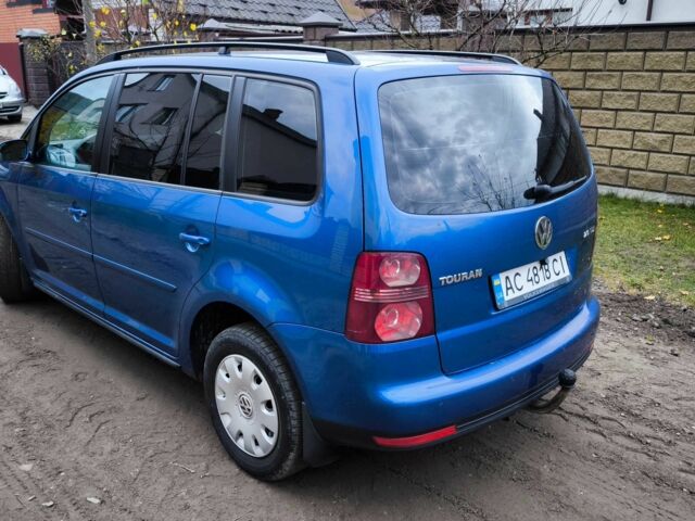 Синій Фольксваген Туран, об'ємом двигуна 2 л та пробігом 358 тис. км за 7500 $, фото 2 на Automoto.ua