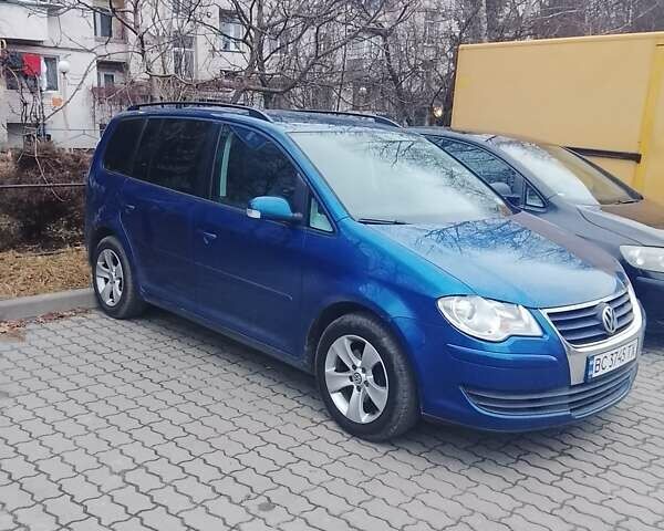 Синий Фольксваген Туран, объемом двигателя 1.39 л и пробегом 170 тыс. км за 7500 $, фото 2 на Automoto.ua