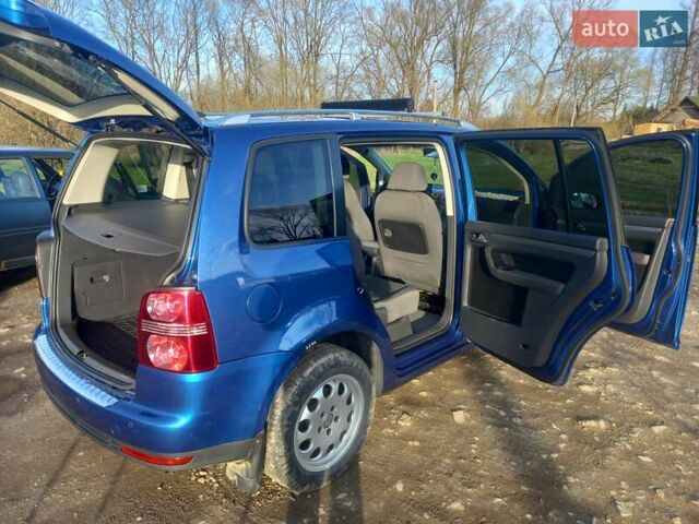 Синий Фольксваген Туран, объемом двигателя 1.9 л и пробегом 289 тыс. км за 8100 $, фото 21 на Automoto.ua