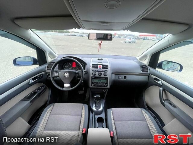 Синий Фольксваген Туран, объемом двигателя 1.4 л и пробегом 198 тыс. км за 6750 $, фото 9 на Automoto.ua