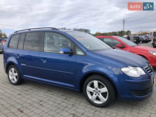 Синий Фольксваген Туран, объемом двигателя 1.6 л и пробегом 209 тыс. км за 7598 $, фото 6 на Automoto.ua