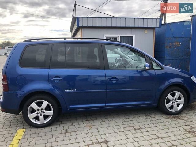 Синий Фольксваген Туран, объемом двигателя 1.6 л и пробегом 209 тыс. км за 7598 $, фото 18 на Automoto.ua