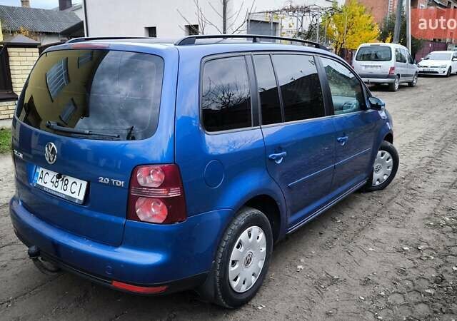 Синій Фольксваген Туран, об'ємом двигуна 2 л та пробігом 358 тис. км за 7500 $, фото 7 на Automoto.ua