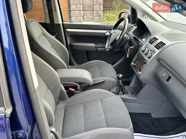 Синий Фольксваген Туран, объемом двигателя 1.4 л и пробегом 229 тыс. км за 6500 $, фото 14 на Automoto.ua