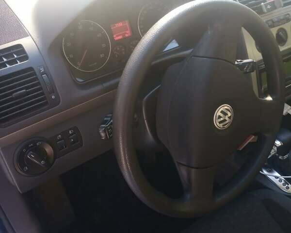 Синий Фольксваген Туран, объемом двигателя 1.4 л и пробегом 205 тыс. км за 7500 $, фото 7 на Automoto.ua