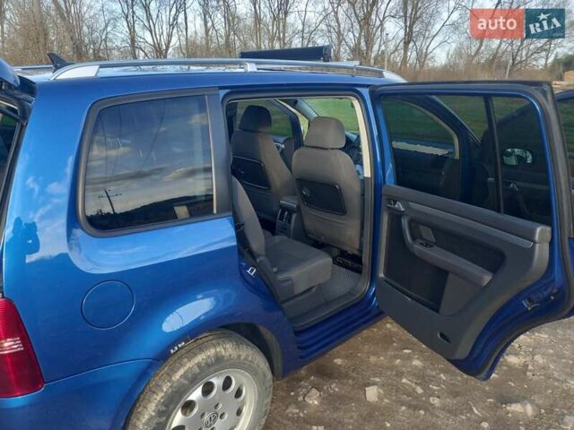 Синий Фольксваген Туран, объемом двигателя 1.9 л и пробегом 289 тыс. км за 8100 $, фото 19 на Automoto.ua