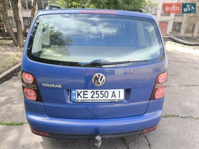 Синий Фольксваген Туран, объемом двигателя 1.6 л и пробегом 250 тыс. км за 7600 $, фото 1 на Automoto.ua