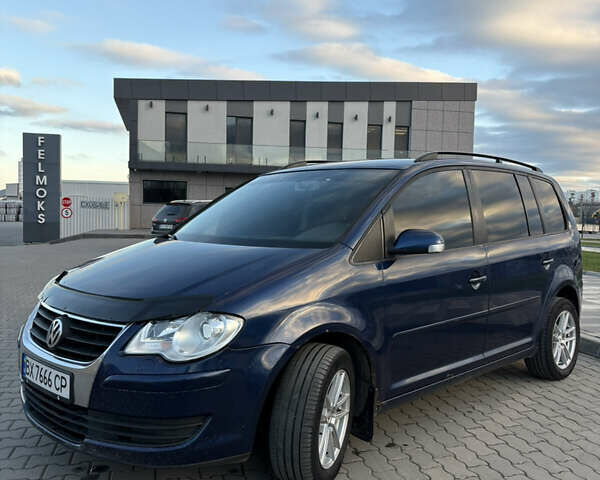 Синій Фольксваген Туран, об'ємом двигуна 1.97 л та пробігом 393 тис. км за 7300 $, фото 1 на Automoto.ua