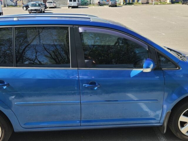 Синий Фольксваген Туран, объемом двигателя 1.9 л и пробегом 345 тыс. км за 7005 $, фото 3 на Automoto.ua