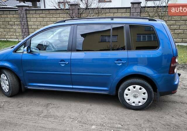 Синій Фольксваген Туран, об'ємом двигуна 2 л та пробігом 358 тис. км за 7500 $, фото 4 на Automoto.ua