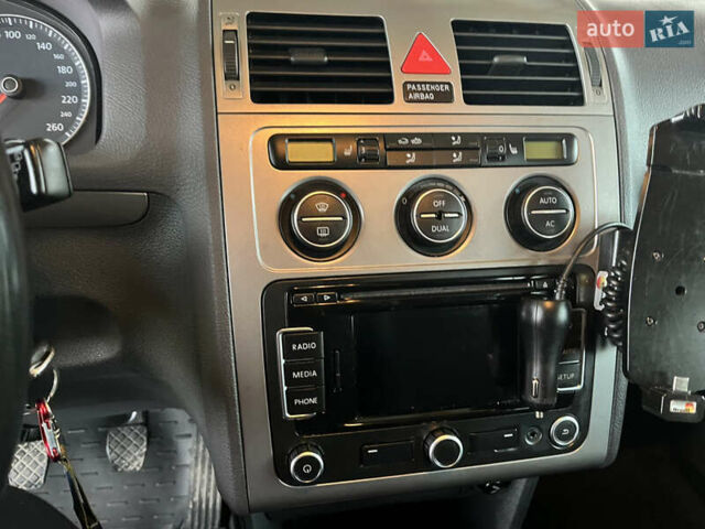 Синий Фольксваген Туран, объемом двигателя 1.39 л и пробегом 270 тыс. км за 7500 $, фото 21 на Automoto.ua