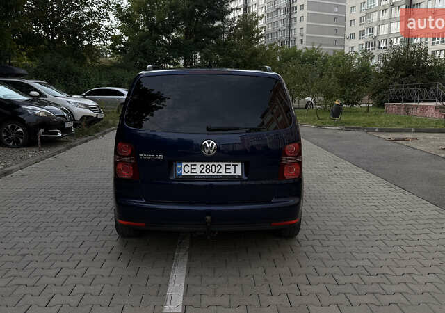 Синий Фольксваген Туран, объемом двигателя 1.4 л и пробегом 235 тыс. км за 8400 $, фото 7 на Automoto.ua