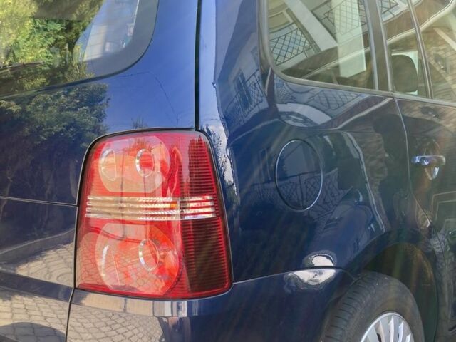 Синий Фольксваген Туран, объемом двигателя 2 л и пробегом 250 тыс. км за 7900 $, фото 4 на Automoto.ua