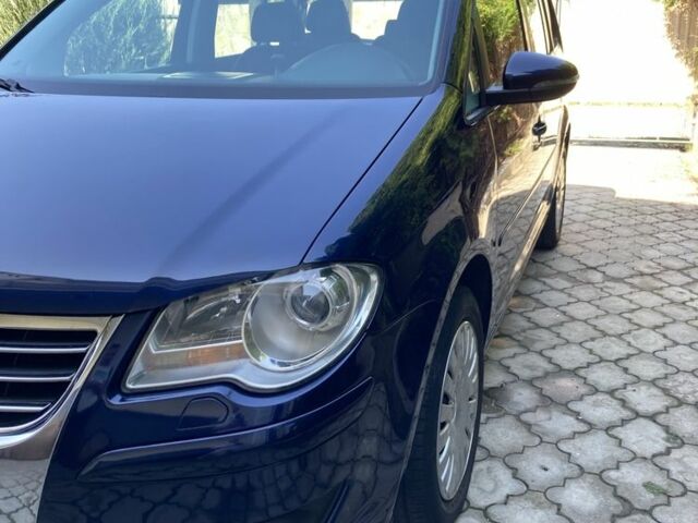 Синий Фольксваген Туран, объемом двигателя 2 л и пробегом 250 тыс. км за 7900 $, фото 1 на Automoto.ua