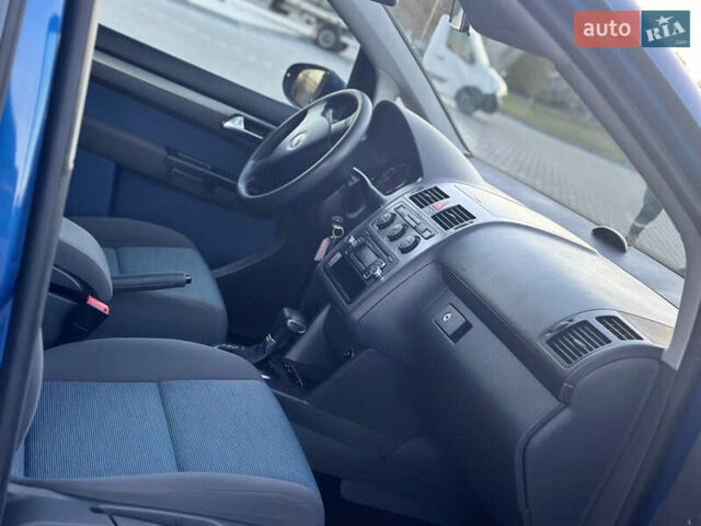 Синий Фольксваген Туран, объемом двигателя 1.4 л и пробегом 220 тыс. км за 7600 $, фото 73 на Automoto.ua