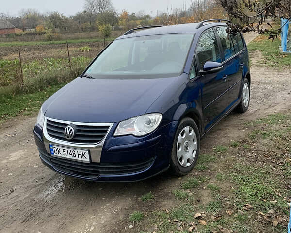 Синий Фольксваген Туран, объемом двигателя 1.39 л и пробегом 190 тыс. км за 6500 $, фото 1 на Automoto.ua