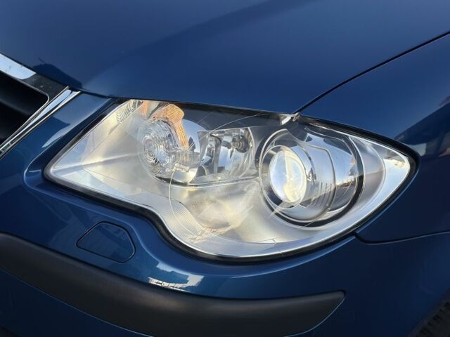 Синій Фольксваген Туран, об'ємом двигуна 1.4 л та пробігом 220 тис. км за 7300 $, фото 6 на Automoto.ua