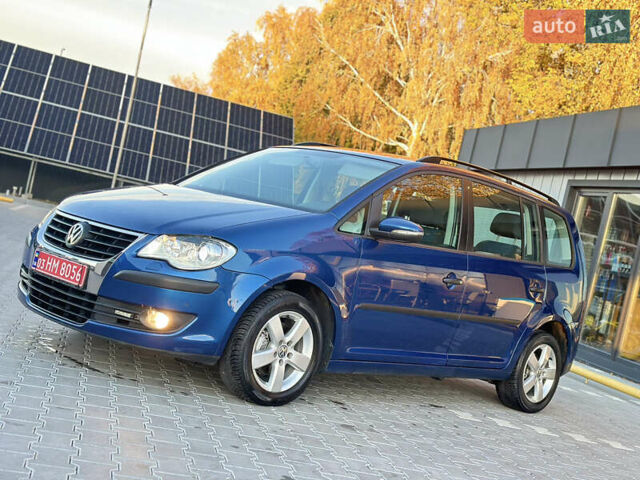 Синий Фольксваген Туран, объемом двигателя 1.4 л и пробегом 220 тыс. км за 7600 $, фото 7 на Automoto.ua