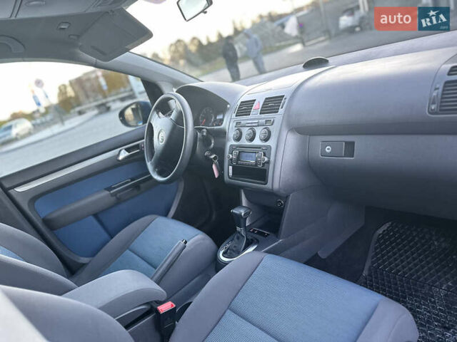 Синий Фольксваген Туран, объемом двигателя 1.4 л и пробегом 220 тыс. км за 7600 $, фото 74 на Automoto.ua