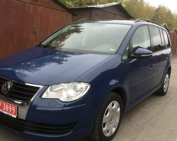 Синий Фольксваген Туран, объемом двигателя 1.6 л и пробегом 214 тыс. км за 7500 $, фото 2 на Automoto.ua