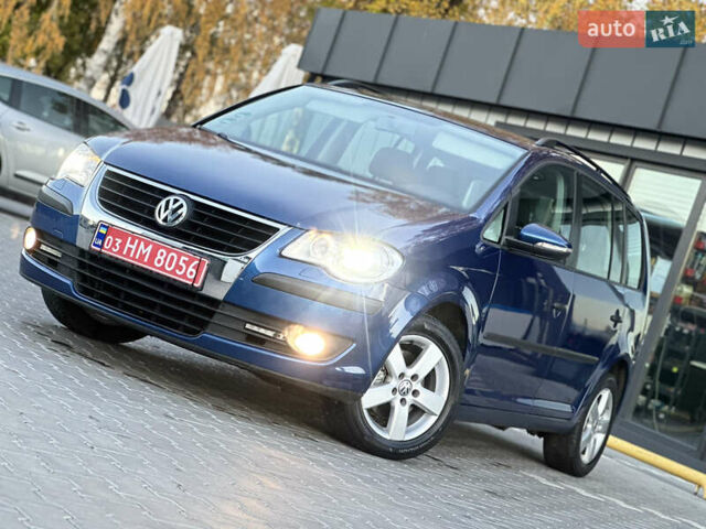 Синий Фольксваген Туран, объемом двигателя 1.4 л и пробегом 220 тыс. км за 7600 $, фото 81 на Automoto.ua
