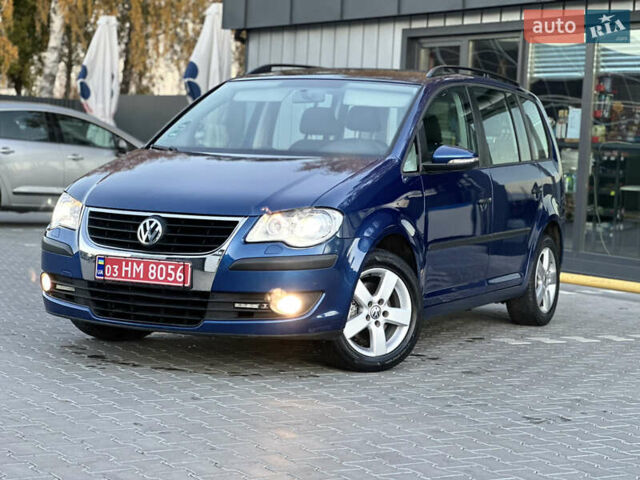 Синий Фольксваген Туран, объемом двигателя 1.4 л и пробегом 220 тыс. км за 7600 $, фото 82 на Automoto.ua