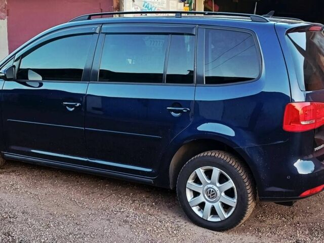 Синій Фольксваген Туран, об'ємом двигуна 1.4 л та пробігом 320 тис. км за 7500 $, фото 2 на Automoto.ua