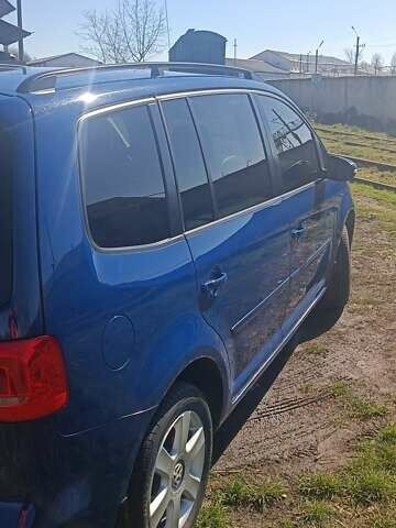 Синий Фольксваген Туран, объемом двигателя 1.6 л и пробегом 256 тыс. км за 9400 $, фото 4 на Automoto.ua