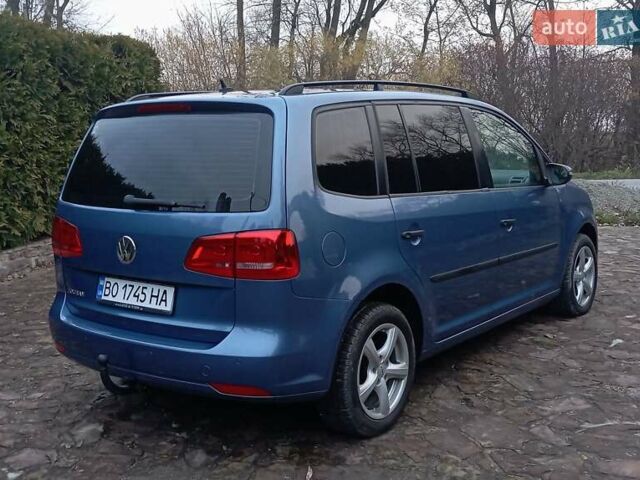 Синий Фольксваген Туран, объемом двигателя 1.2 л и пробегом 160 тыс. км за 7650 $, фото 17 на Automoto.ua