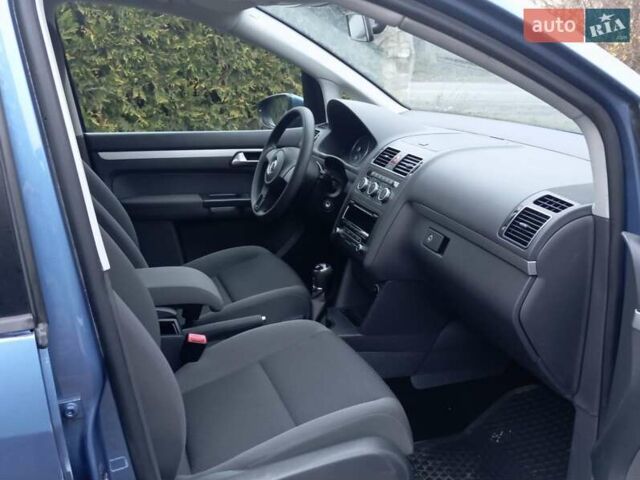 Синий Фольксваген Туран, объемом двигателя 1.2 л и пробегом 160 тыс. км за 7650 $, фото 38 на Automoto.ua