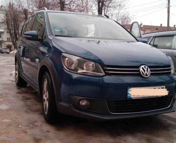 Синий Фольксваген Туран, объемом двигателя 1.4 л и пробегом 230 тыс. км за 8800 $, фото 1 на Automoto.ua